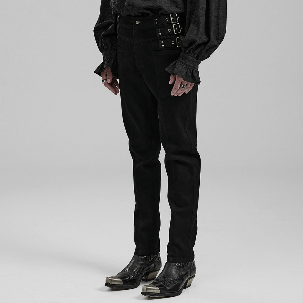 Slim-fit gothic PUNK denim pants with studded waist, styled with edgy dark shirt and boots.
