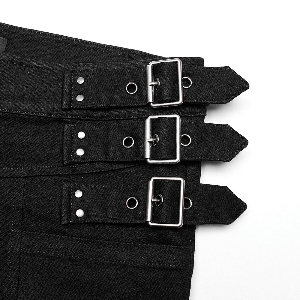 Close-up of the studded waist detail on gothic PUNK denim pants with silver buckles for a stylish edge.