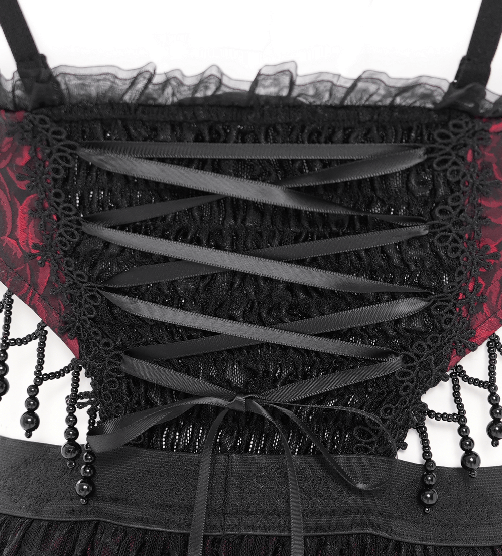 Close-up of the lace-up back of a stunning Gothic floral corset dress with intricate detailing and elegant black ribbons.