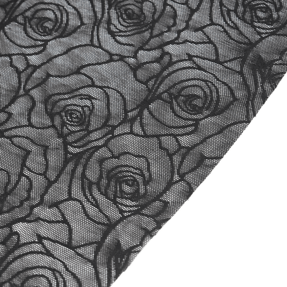 Close-up of intricate black lace with rose pattern, perfect for gothic floral corset dress detailing.