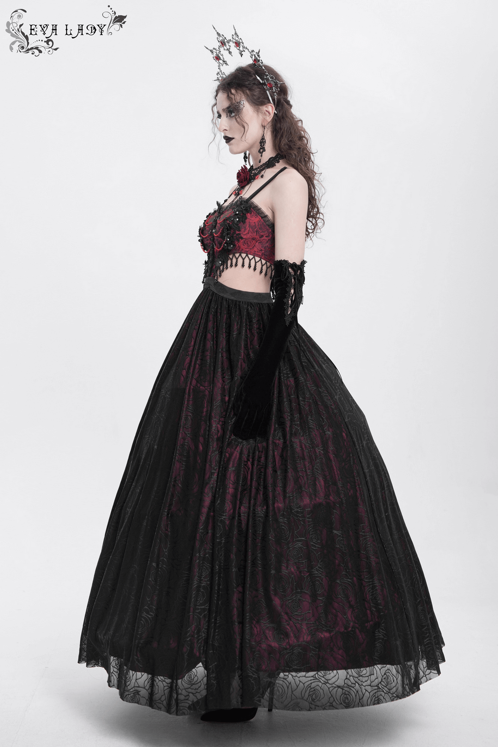 Elegant Gothic floral corset dress with sheer lace skirt and intricate detailing, perfect for dark romantic events.