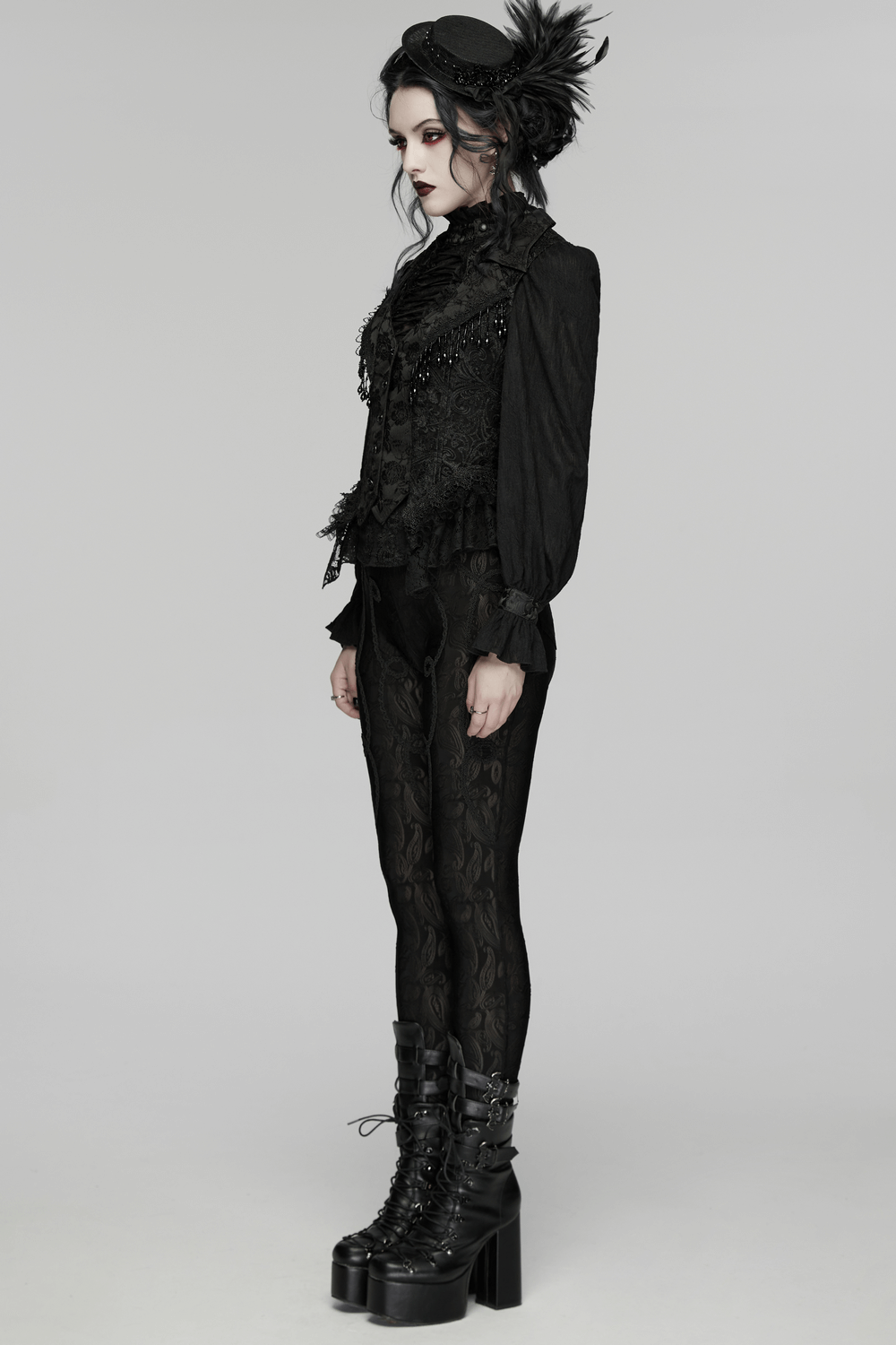 Stunning Waistcoat with Tassels and Ruffle Hem for Women worn by a model in a dramatic Gothic style.
