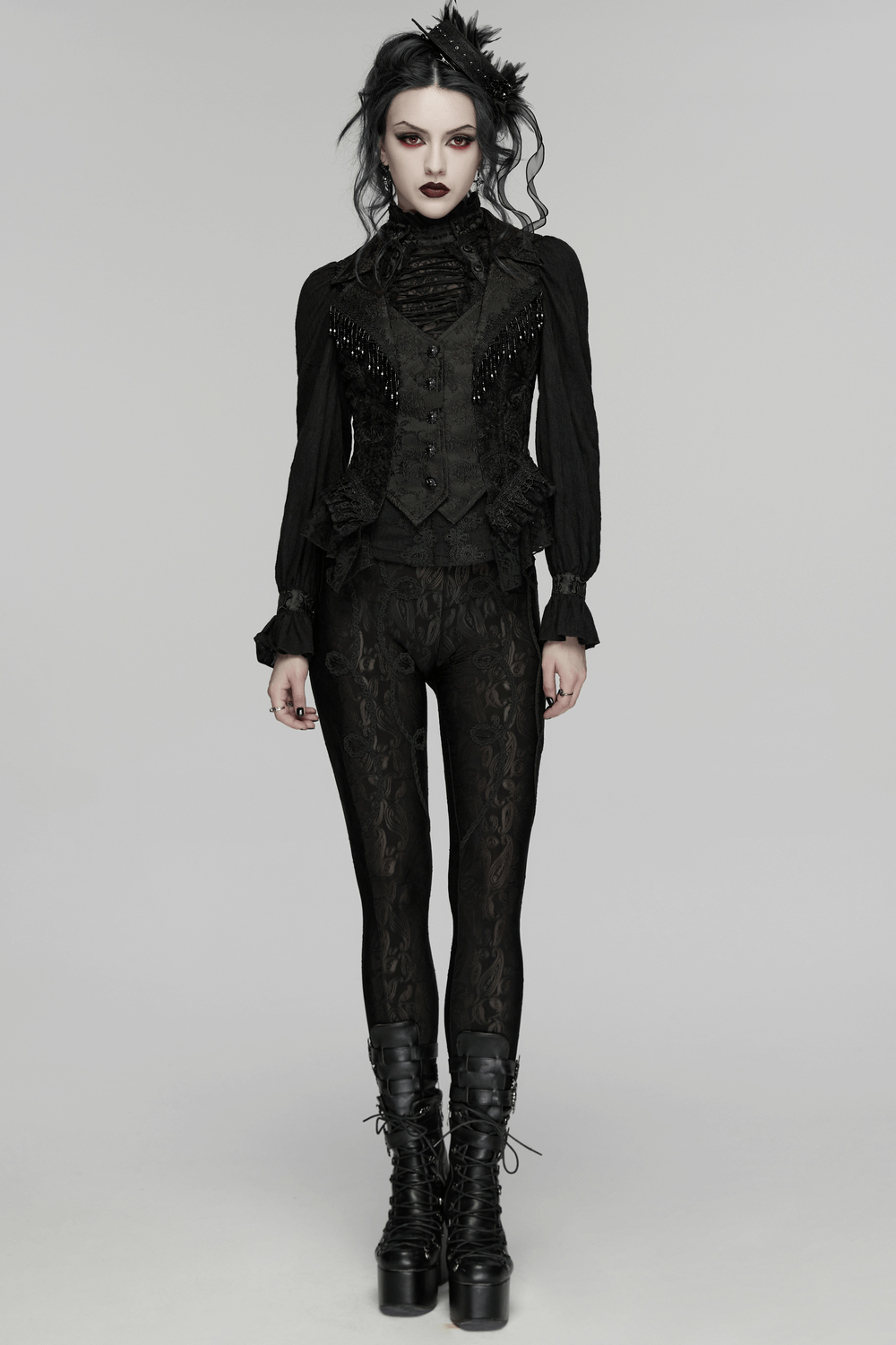 Stunning Waistcoat with Tassels and Ruffle Hem for Women worn by a model in a dark Gothic outfit.
