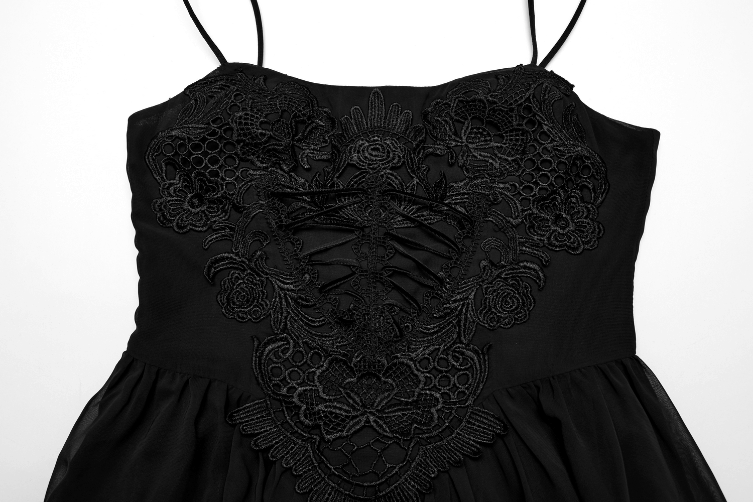 Close-up of stunning black chiffon dress with intricate floral embroidery and adjustable straps, perfect for gothic elegance.