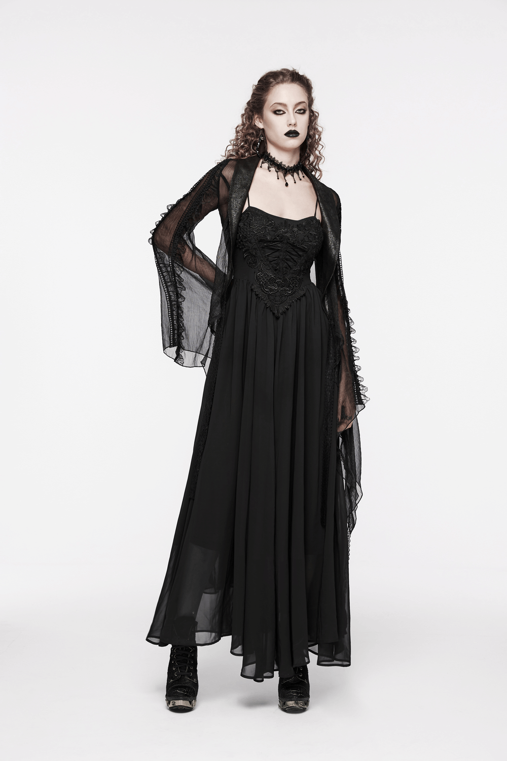 Stunning black long dress with adjustable straps and chiffon overlay, perfect for gothic fashion lovers.