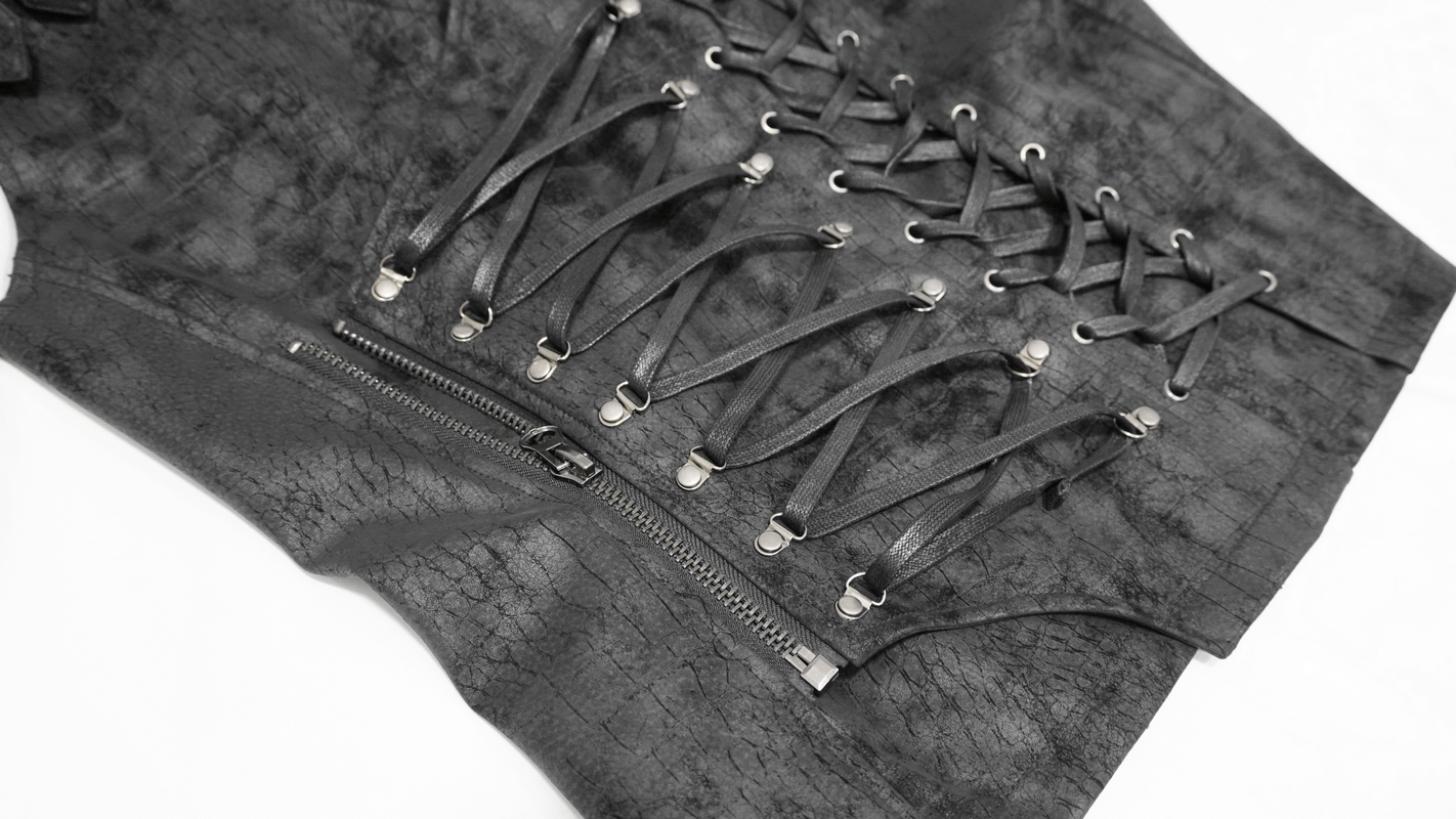 Close-up of a stylish black asymmetric vest with lacing and zipper, perfect for a gothic fashion statement.