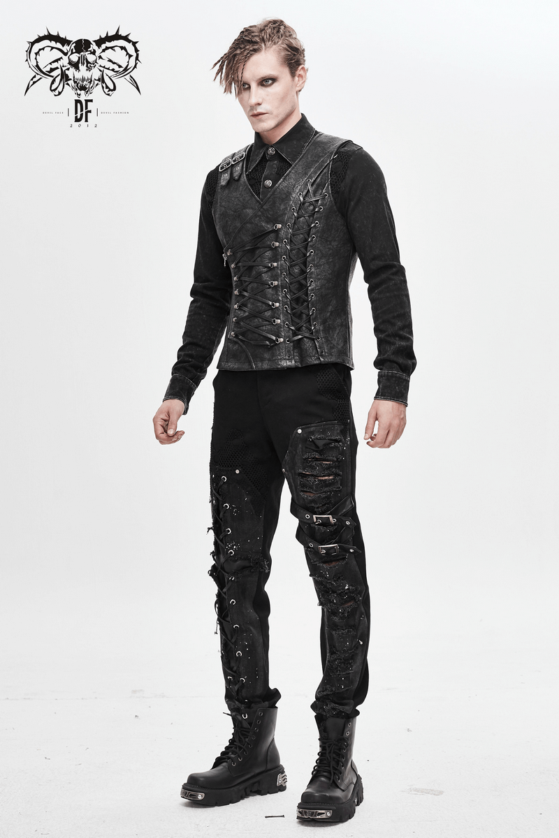 Men's black asymmetric vest with lacing, paired with stylish dark pants, exemplifying gothic fashion.