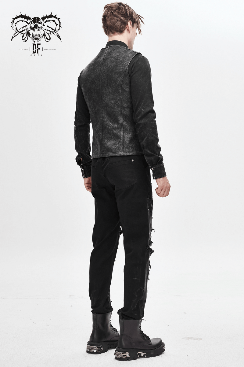 Back view of a stylish black asymmetric men's vest made from PU leather, paired with black ripped pants and boots.