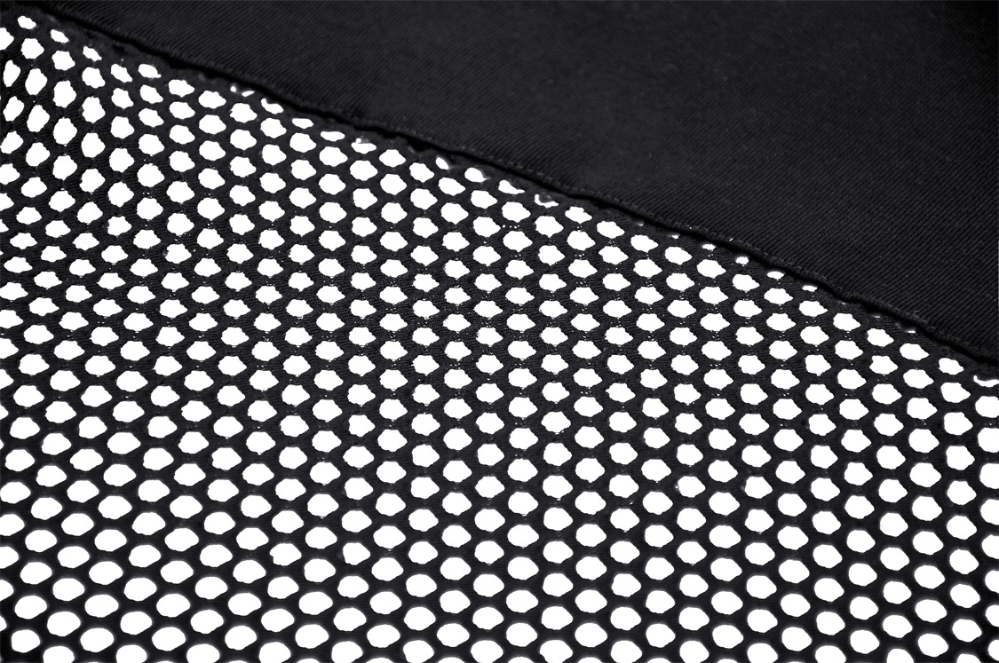 Close-up of stylish black mesh fabric featuring unique cut-out design, perfect for edgy punk-inspired fashion.