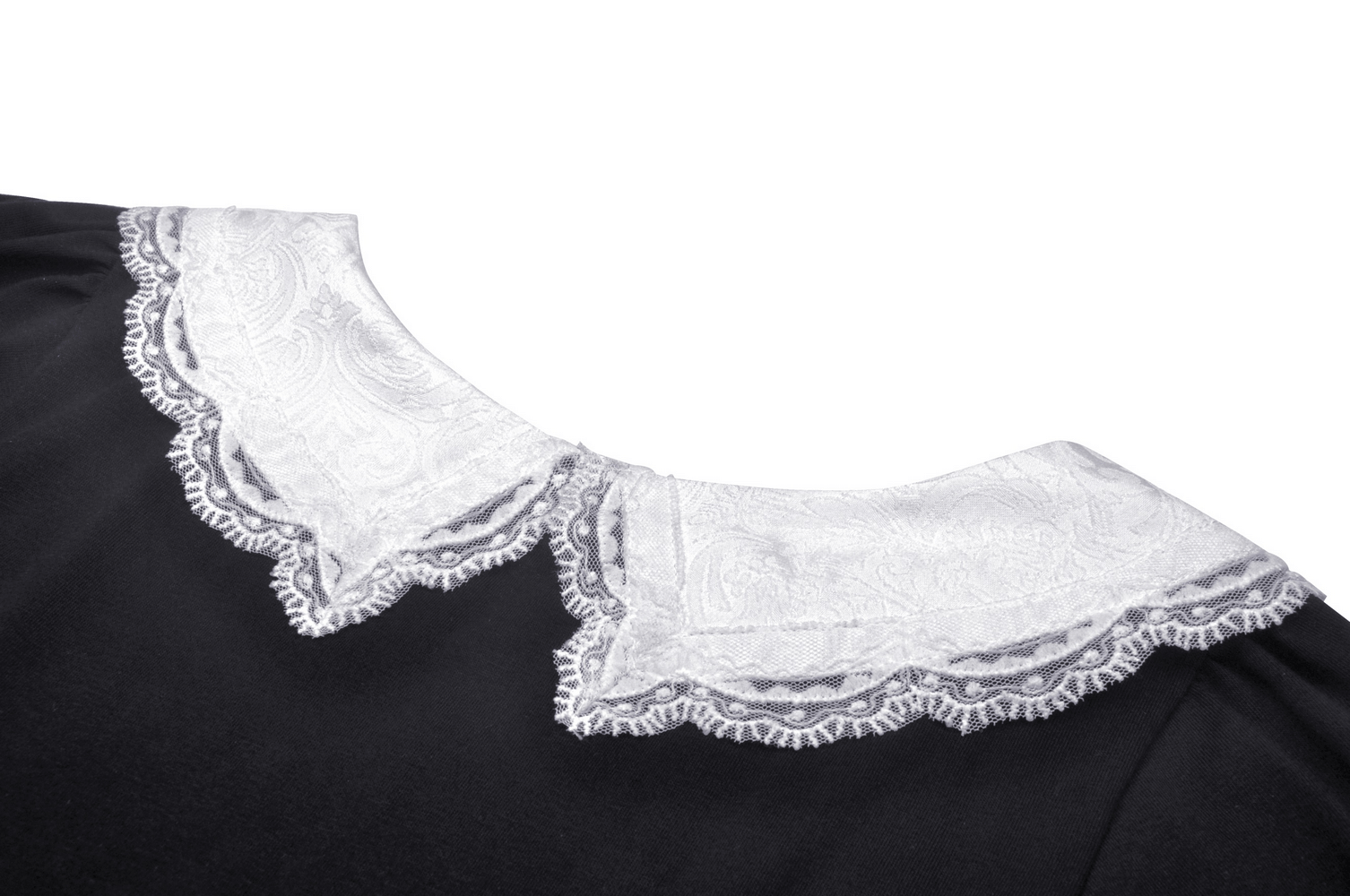 Close-up of a stylish black crop top featuring a white scalloped lace Peter Pan collar, adding a touch of Victorian charm.