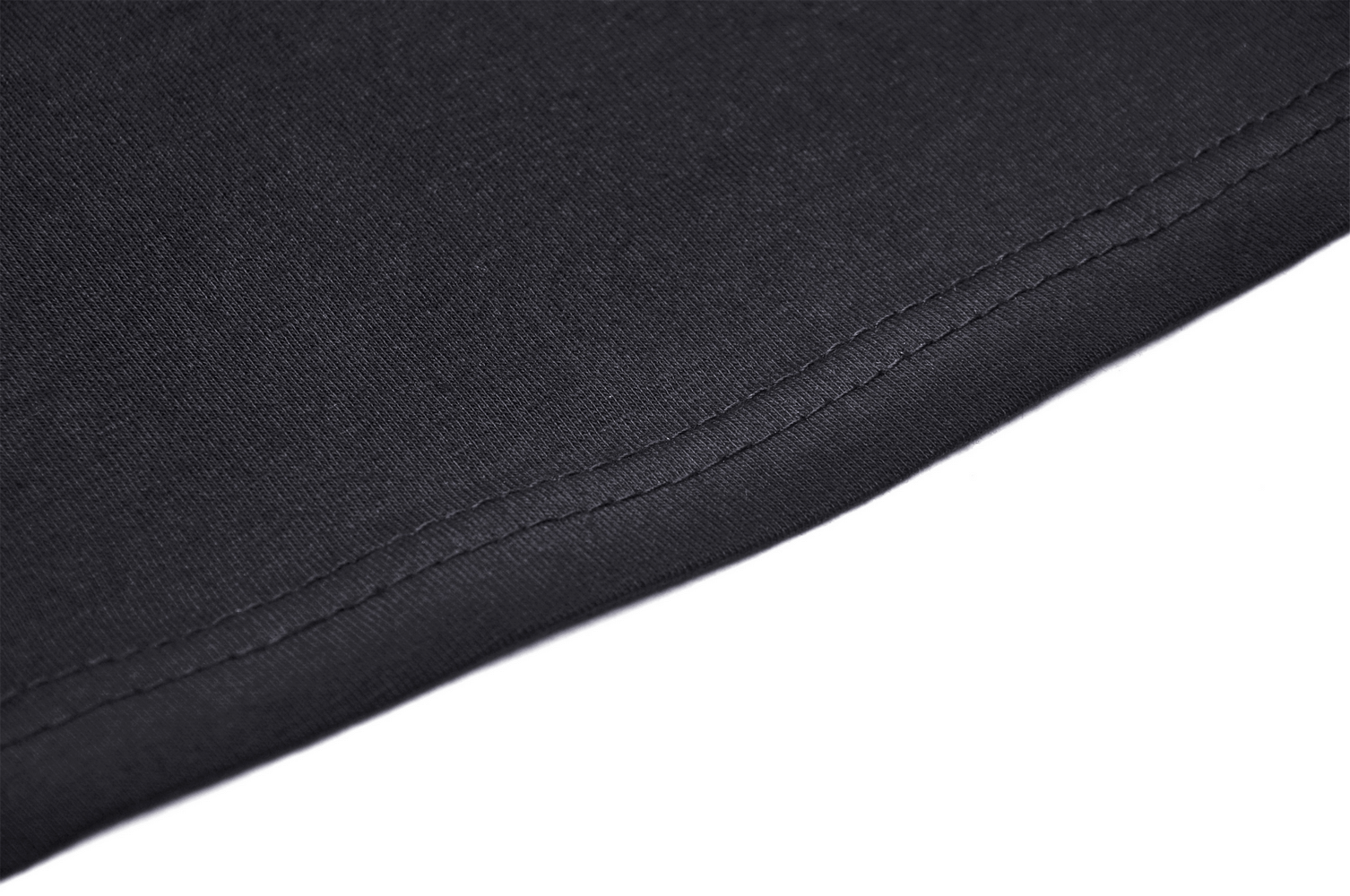 Close-up of the stylish black crop top fabric showcasing smooth stitching details for a sleek fit.