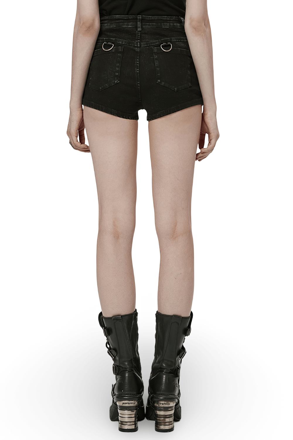 Back view of stylish black denim shorts-skirt with hollow-out design, paired with edgy black boots.