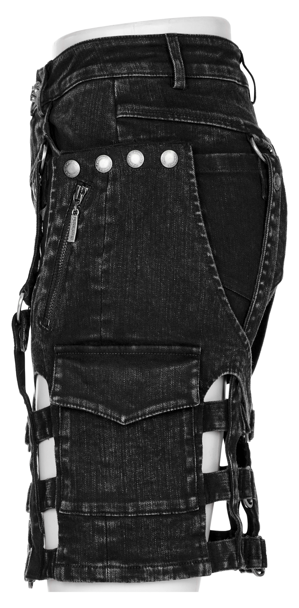 Side view of stylish black denim shorts-skirt with edgy designs, featuring unique hollow-out details and pockets.