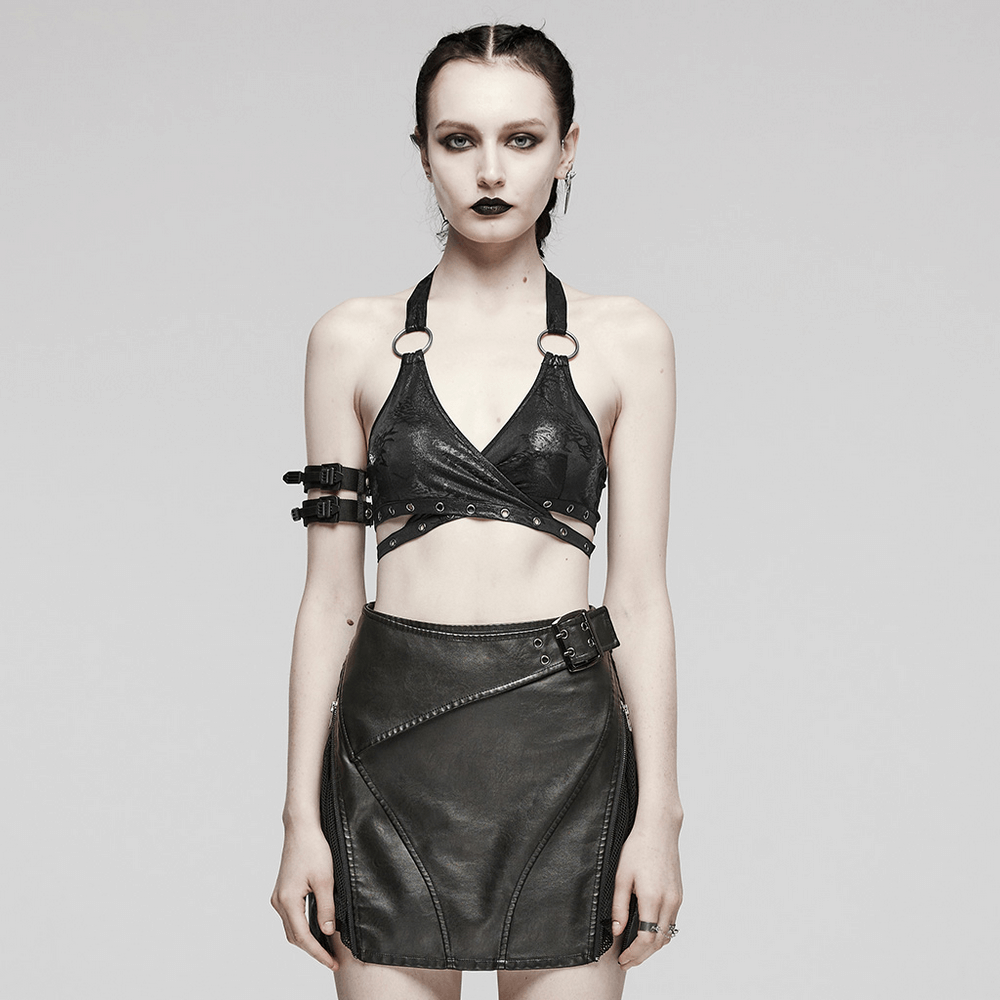 Punk rock black halter crop top with ring detailing and edgy skirt, perfect for alternative fashion lovers.