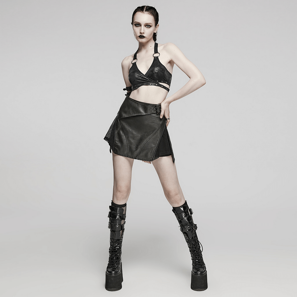 Punk rock model in stylish black halter crop top with ring detailing and matching skirt, showcasing edgy alternative fashion.