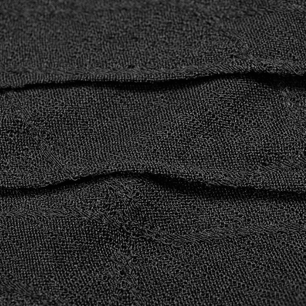 Close-up of black lace fabric with textured details for stylish punk halter top.