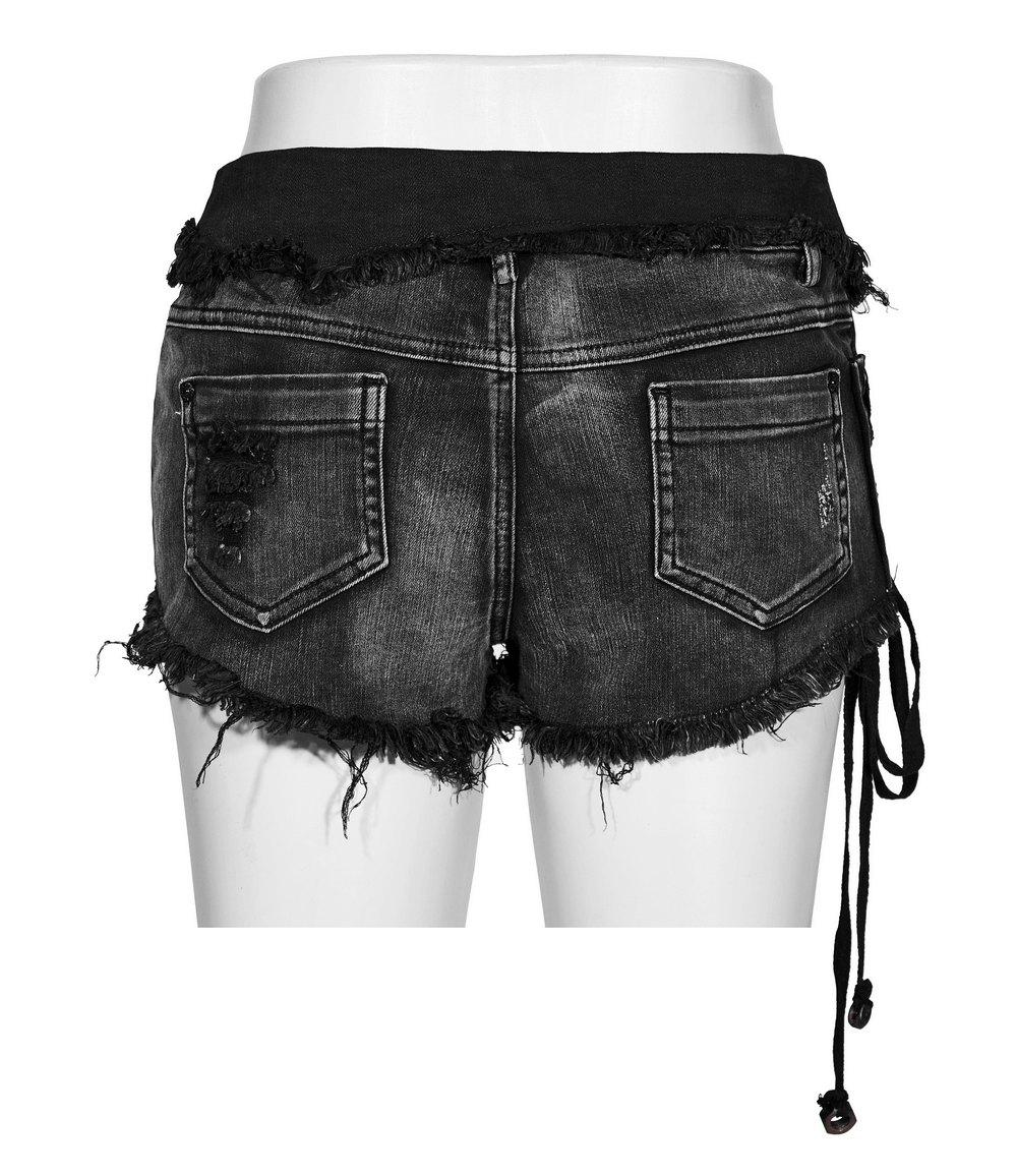 Back view of stylish black lace-up denim shorts featuring rivet details and frayed edges.