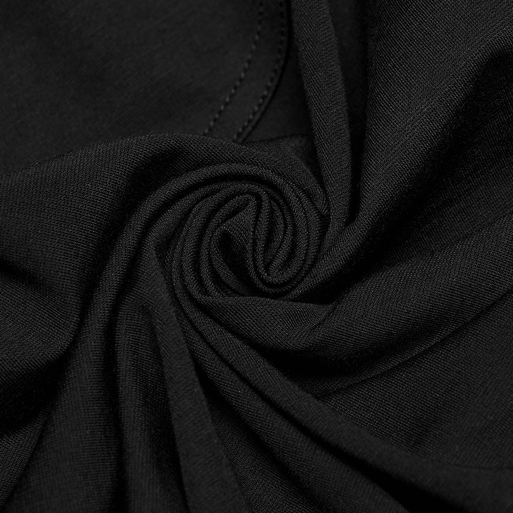 Close-up of soft black fabric showcasing the elastic texture of stylish women's leggings.