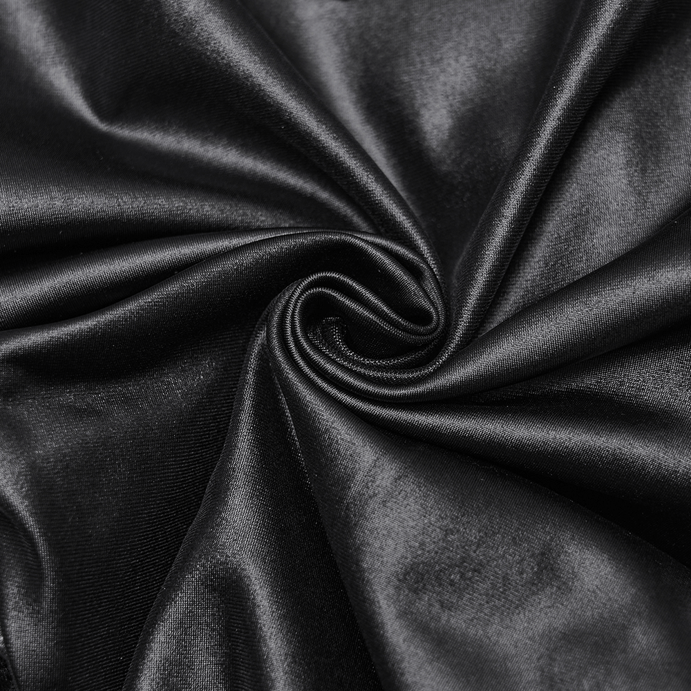 Stylish Black Leggings with Woven Cross and Buckle Detail fabric close-up showing glossy stretch material.