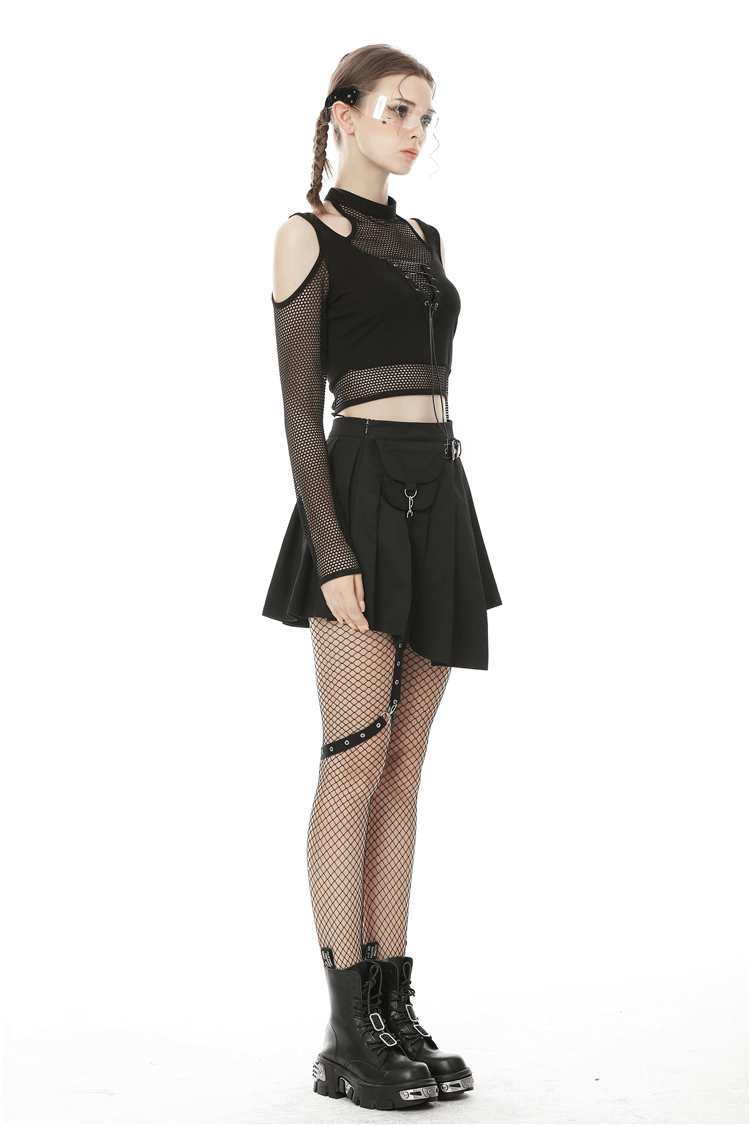Stylish black mesh crop top with cold shoulders, paired with a skirt, fishnet stockings, and edgy boots.