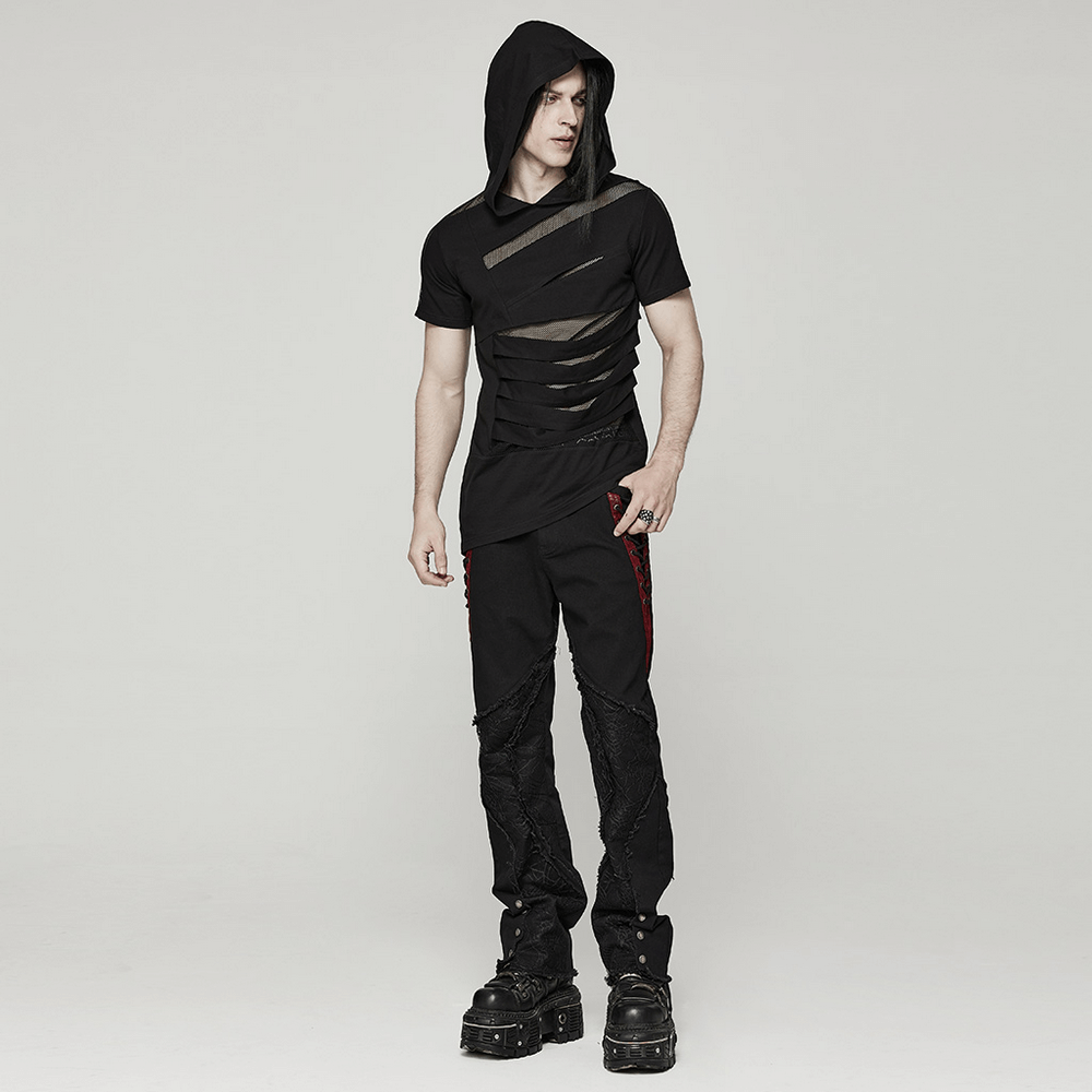 Stylish black mesh spliced punk hooded t-shirt worn by a model, showcasing an edgy and rebellious fashion vibe.