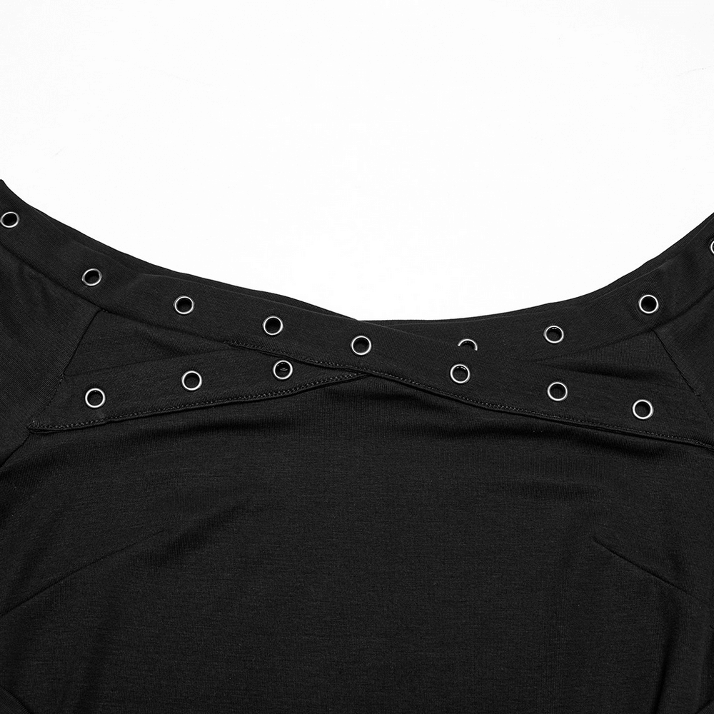 Close-up of a stylish black off-shoulder T-shirt featuring eyelet details and a unique neckline design.