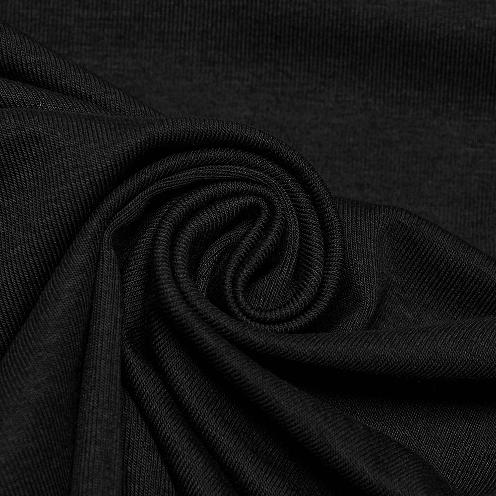 Close-up of soft, black knit fabric showcasing its stretch and texture for stylish off-shoulder T-shirt.