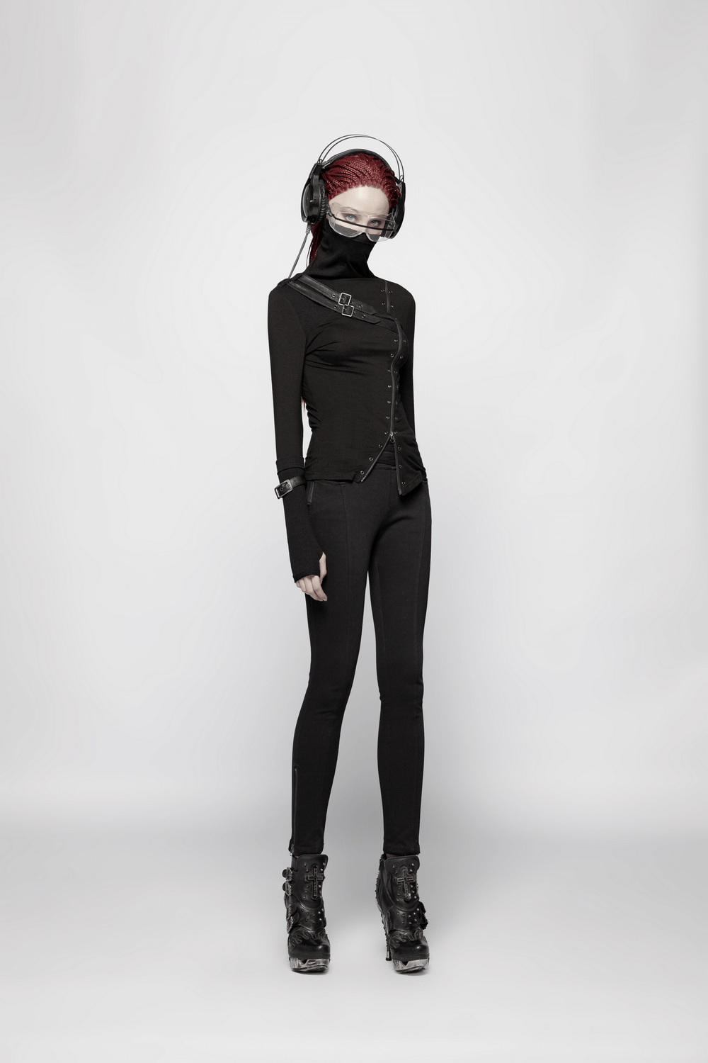 Model in stylish black punk turtleneck with zipper, headphones, and edgy look for a rockstar vibe.