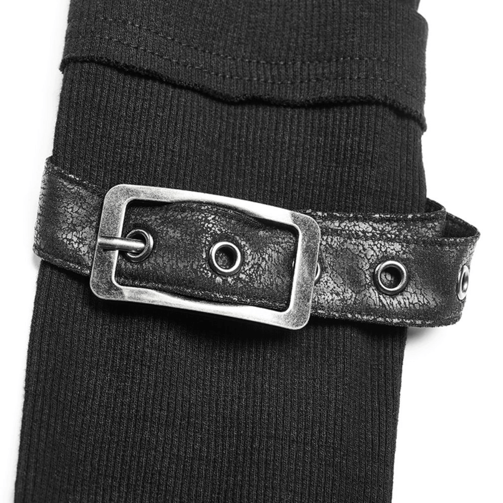 Close-up of stylish black punk turtleneck with eyelet detailing and metal buckle for a bold edge.