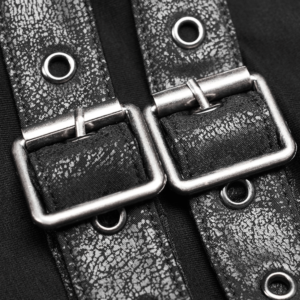 Close-up of metallic buckles and eyelet detailing on black punk turtleneck zipper top, showcasing edgy design.