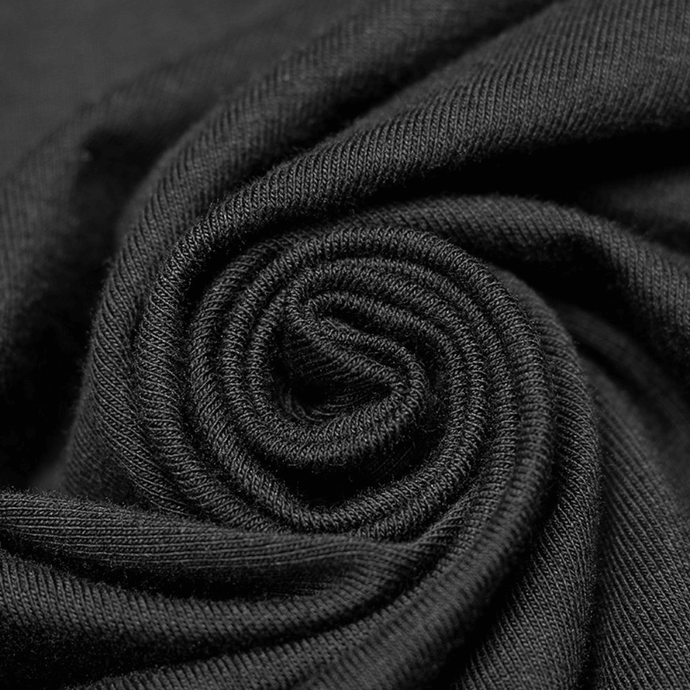 Close-up shot of soft black fabric in a rolled swirl, showcasing the stretchy knit material for a punk turtleneck top.