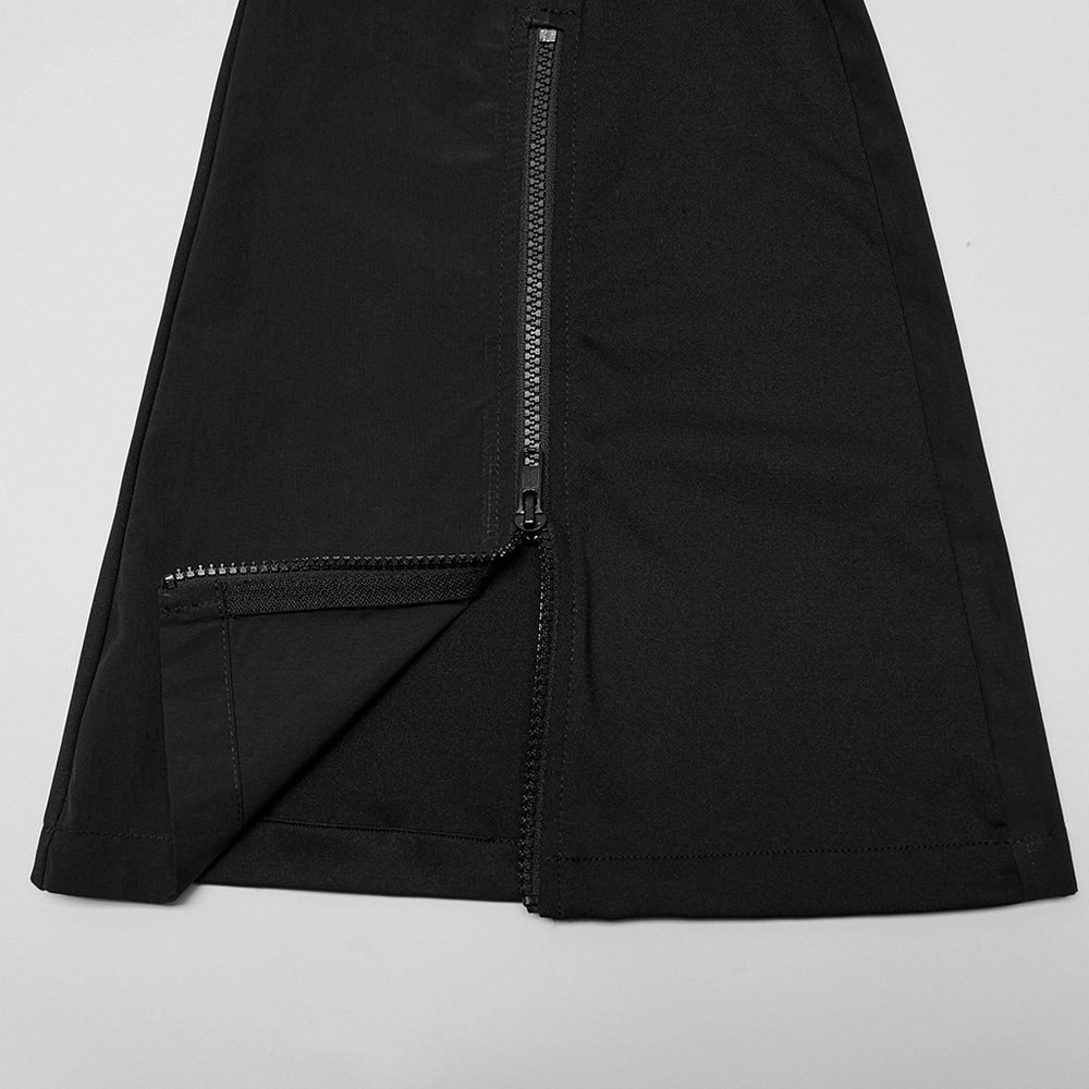 Close-up of flared cargo pants featuring black zipper details and fabric splicing for a stylish techwear look.