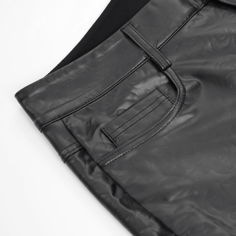 Close-up of stylish black slim fit stretch leather trousers, showcasing the textured fabric and classic five-pocket design.