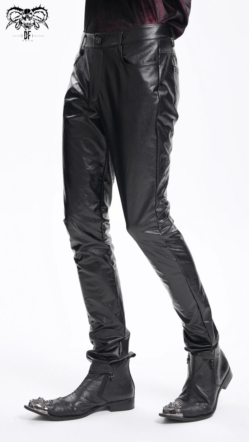 Stylish black slim fit leather trousers for men, featuring a sleek silhouette and paired with trendy ankle boots.