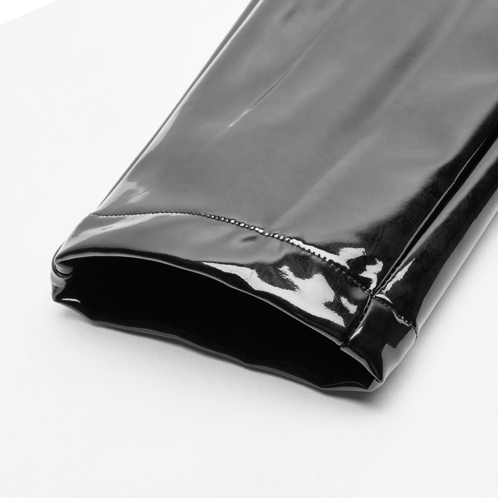 Close-up of high-waisted black shiny vinyl leggings showcasing sleek finish and zipper detail.