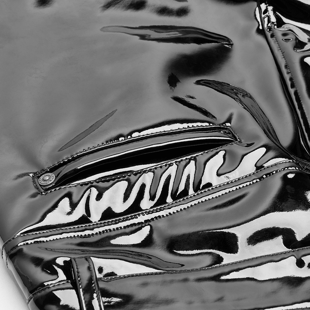 Close-up of high-shine black vinyl leggings with zipper closure, showcasing glossy finish and stylish design.