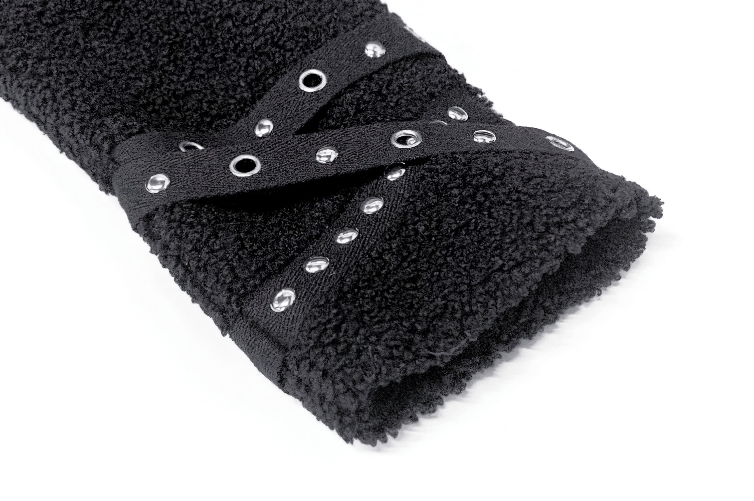 Close-up of the stylish black cropped hoodie sleeve, featuring edgy silver spikes and a soft fleece texture.