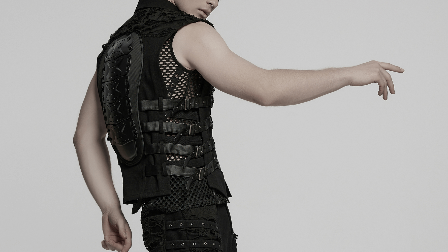 Stylish cyberpunk black vest for men with armored back panel and punk warrior vibe.
