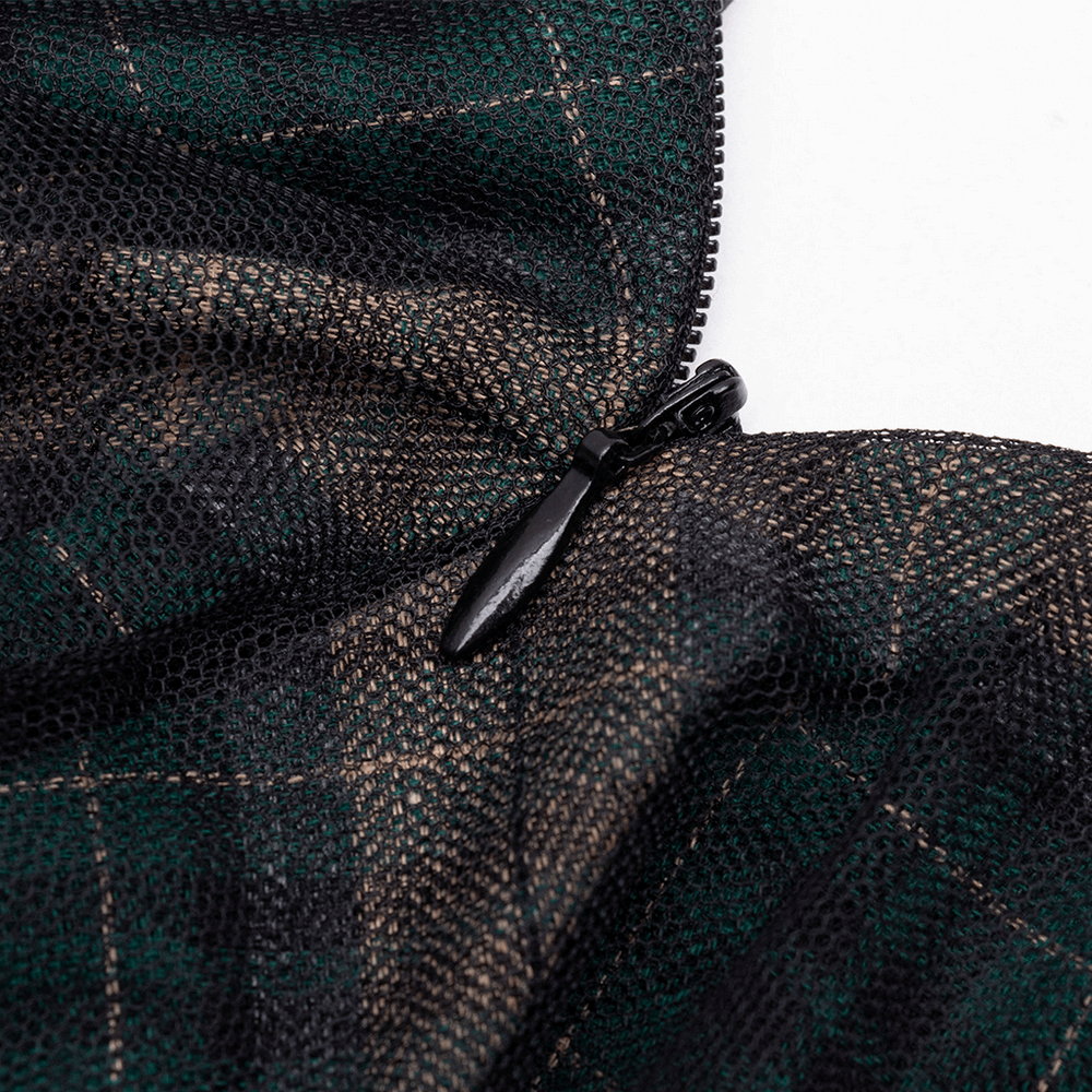 Close-up of stylish dark punk grunge plaid mesh fabric with zipper detail, showcasing edgy design and texture.