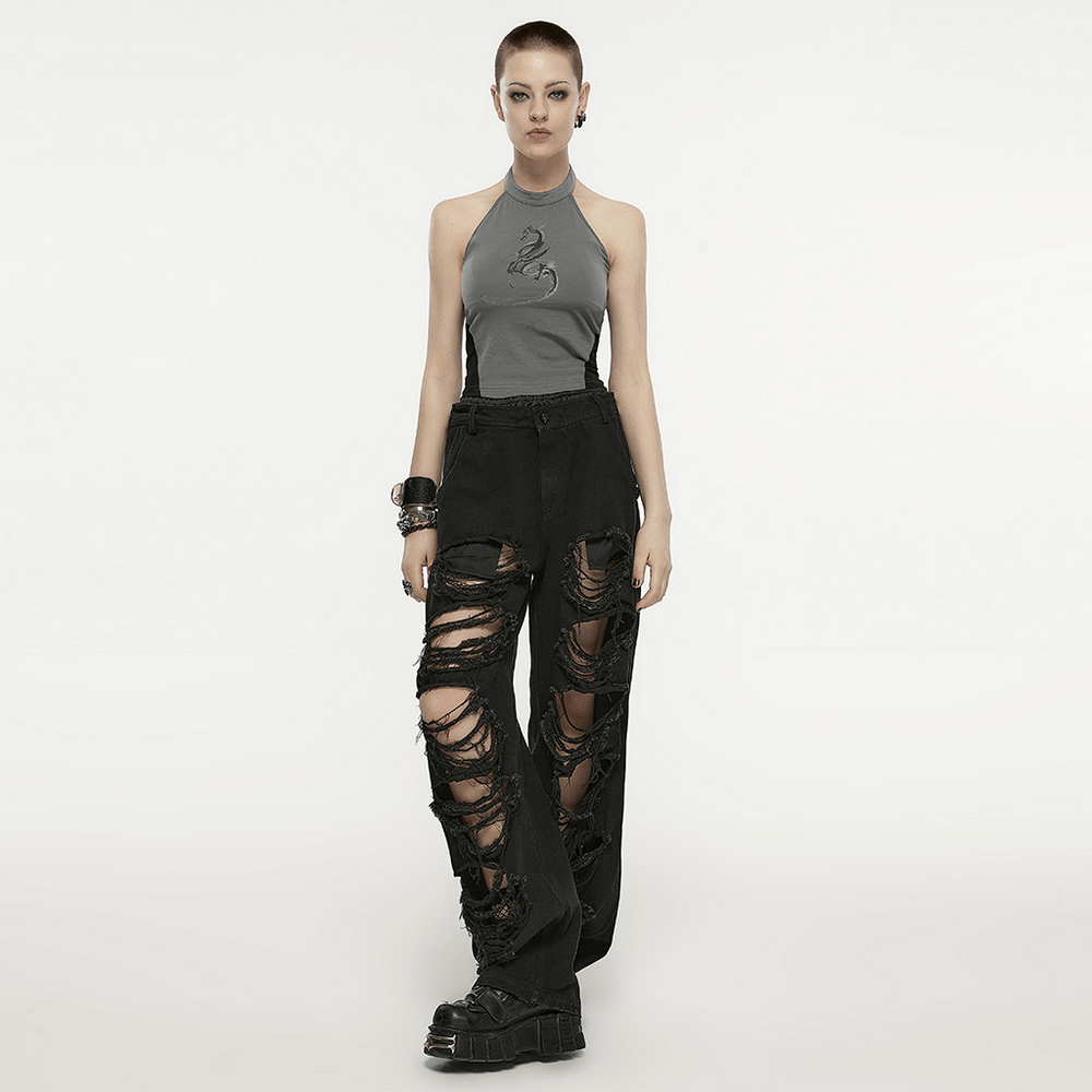 Young model in stylish dragon print halter neck top and ripped black pants, showcasing a bold fashion statement.