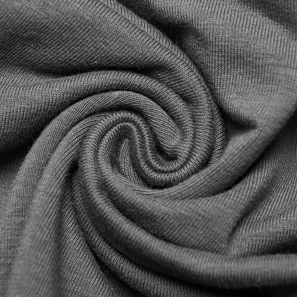 Close-up of soft, stretchy gray fabric in a swirl pattern, perfect for comfortable tops.