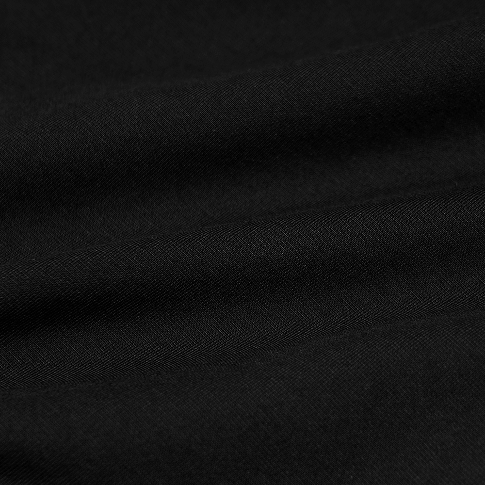 Close-up of soft black fabric, perfect for stylish edgy mesh-paneled leggings with a gothic flair.
