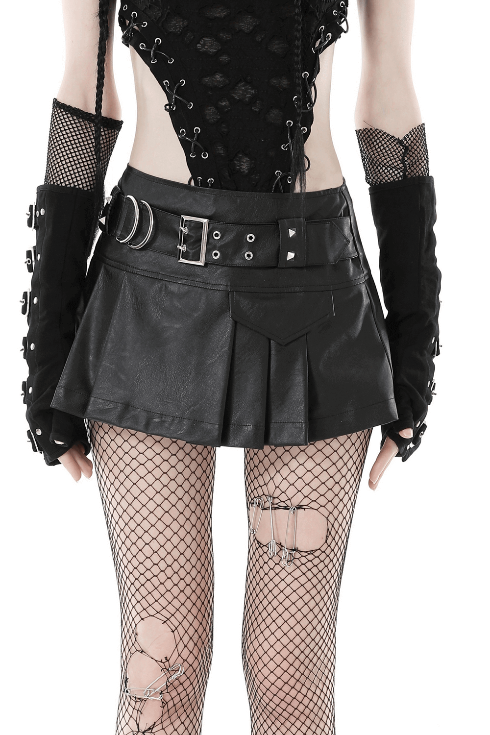 Gothic punk style black faux leather pleated mini skirt with buckle and edgy accessories.