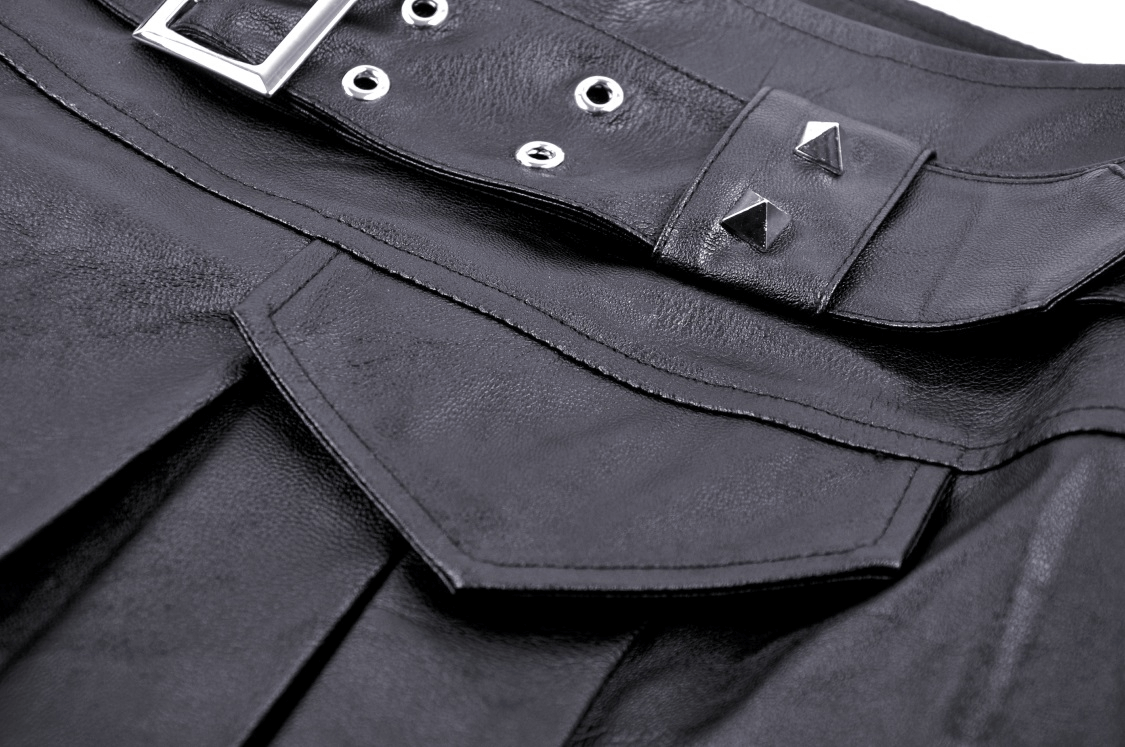 Close-up of stylish faux leather pleated mini skirt with buckle and metal studs, perfect for a goth punk look.