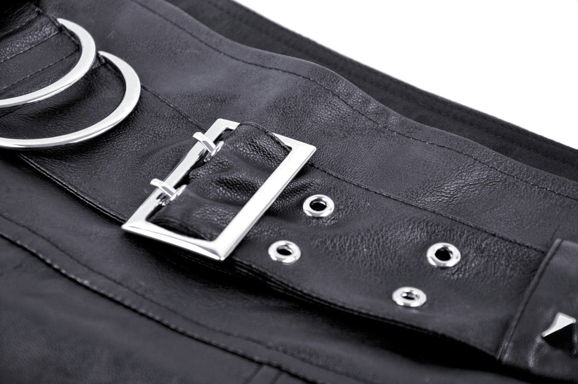 Close-up of black faux leather mini skirt buckle and pleat details for stylish gothic punk fashion.