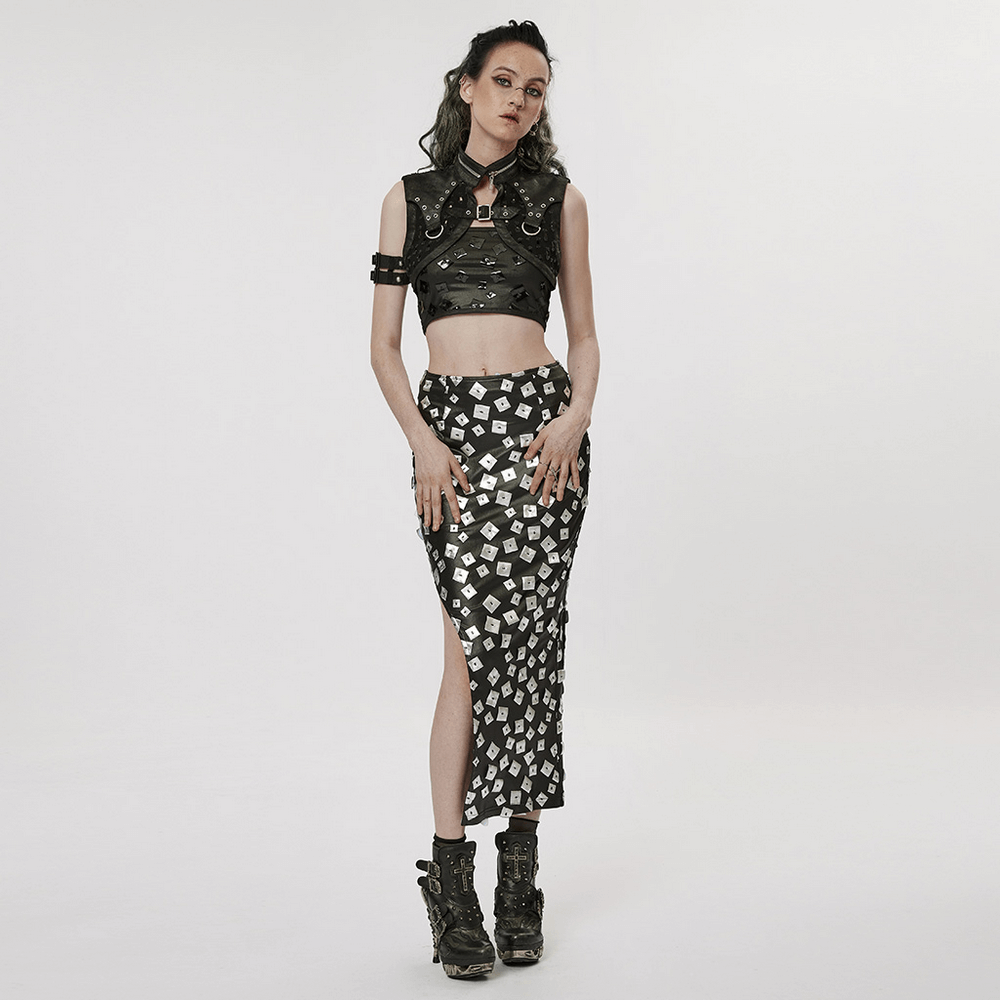 Stylish goth in a black studded waistcoat and patterned skirt, showcasing punk fashion with edgy accessories.