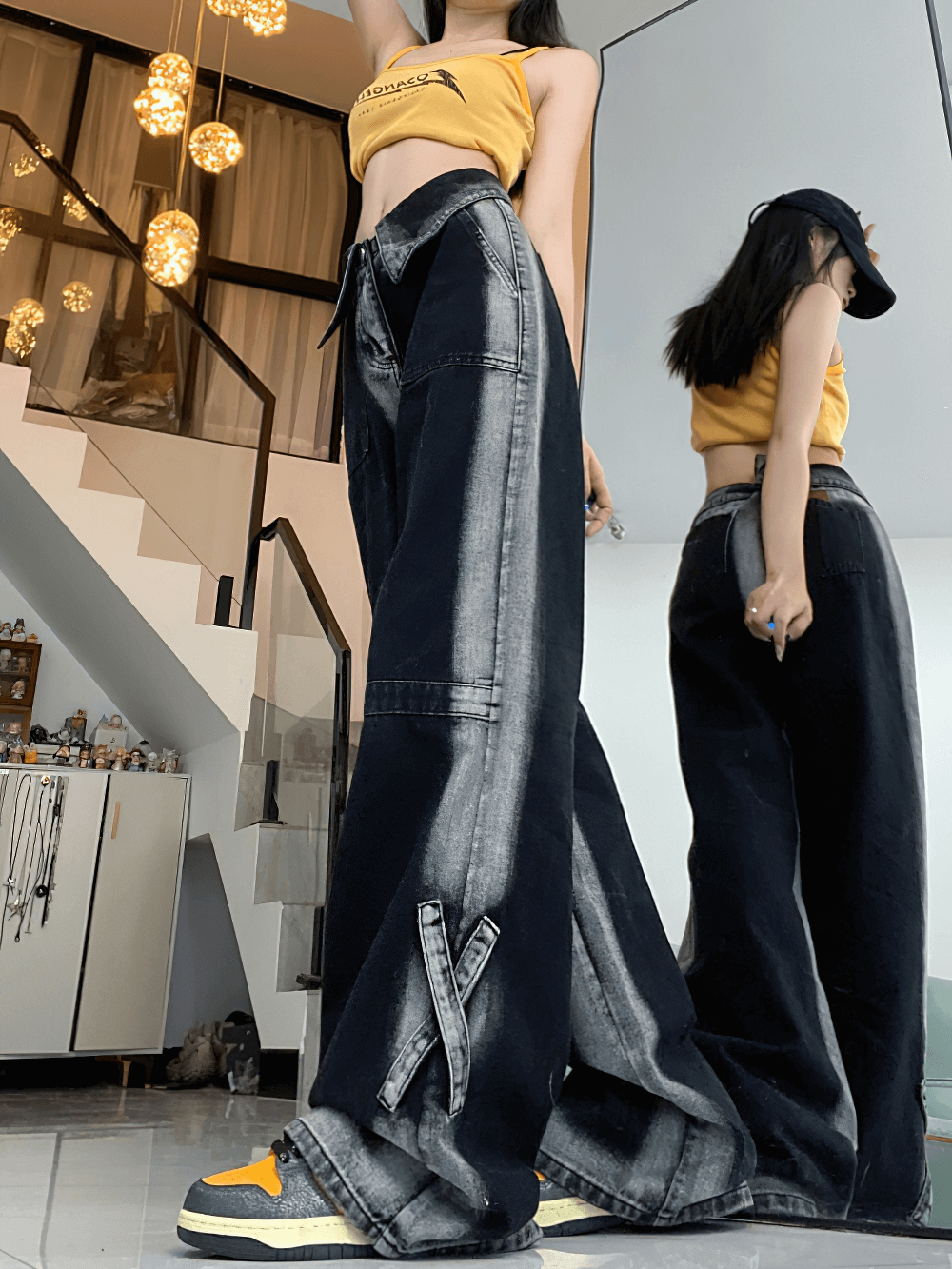 Stylish high waist straight denim pants on model, showcasing a loose fit and alternative street style in a chic indoor setting.