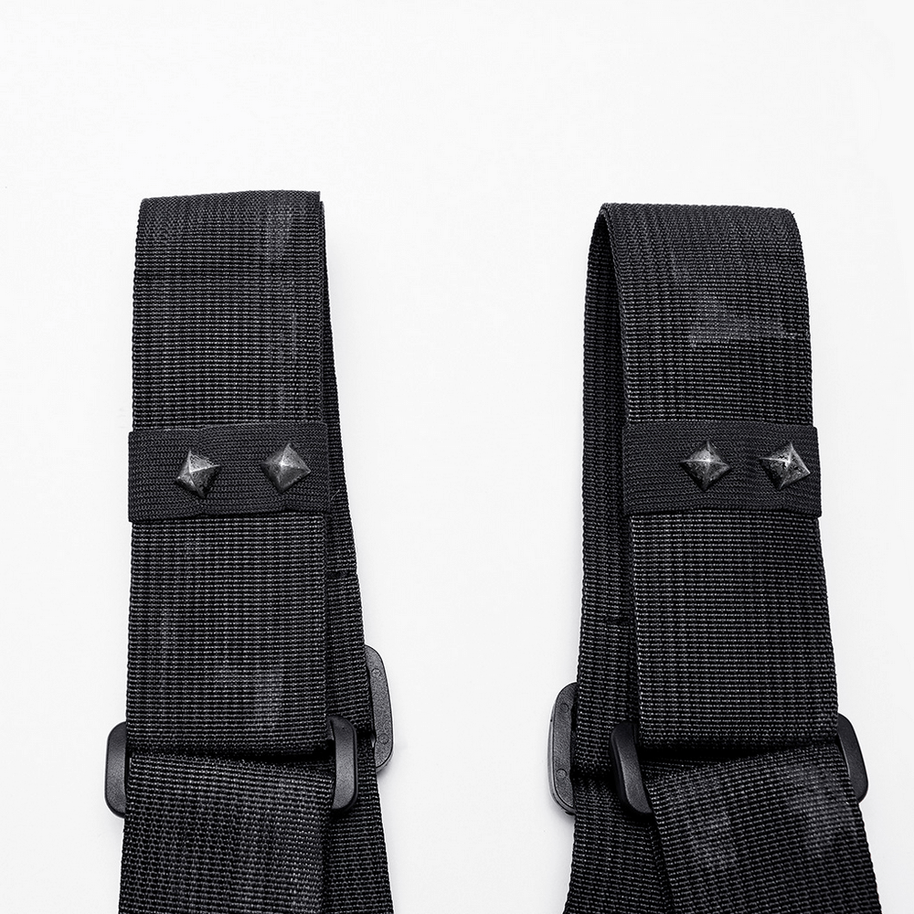 Close-up of adjustable black nylon straps with punk-style studded rivets for a stylish bag.