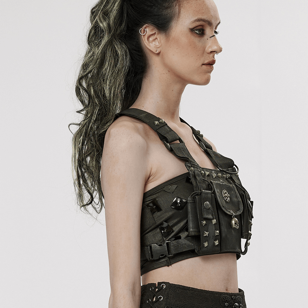 Stylish punk female model showcasing a black studded strap bag with rivets, perfect for a post-apocalyptic look.