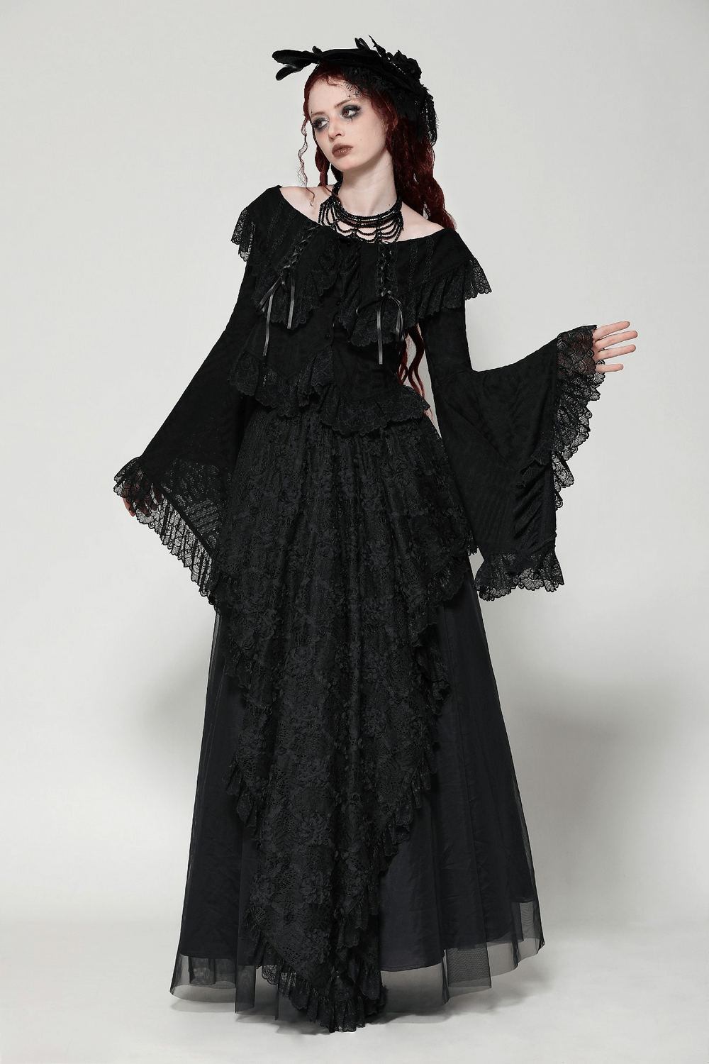 Stylish goth off-shoulder blouse with bell sleeves and ruffled lace, perfect for embracing dark fashion elegance.